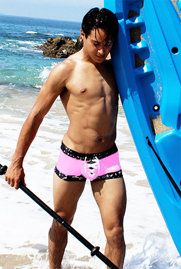 Icker Sea lace up contrast square cut swim trunks in pink with black trim designed for beachwear