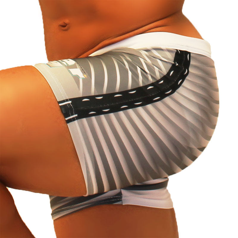 Icker sea steel lines square cut trunk swimwear gray with white stripes and black accent stripe worn by a person