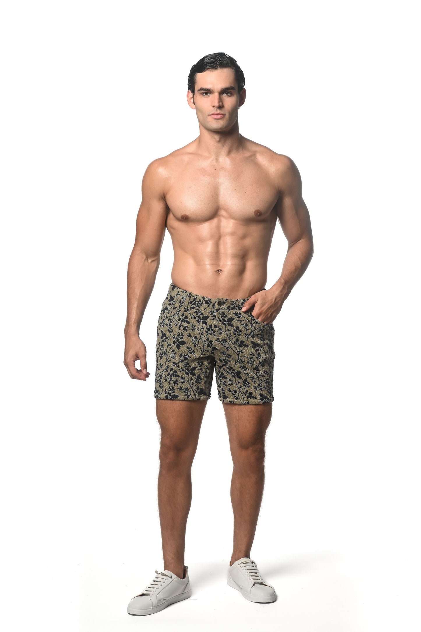 Men’s jacquard printed stretch knit shorts in olive green with a black floral pattern for casual wear