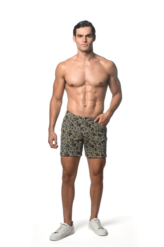 Men’s jacquard printed stretch knit shorts in olive green with a black floral pattern for casual wear