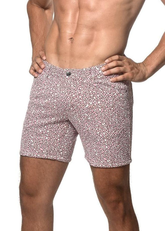 Jacquard printed stretch knit shorts in soft pink fabric with an abstract geometric pattern for men