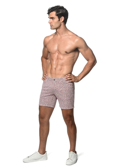 Pink jacquard printed stretch knit shorts with a subtle speckled pattern perfect for casual wear
