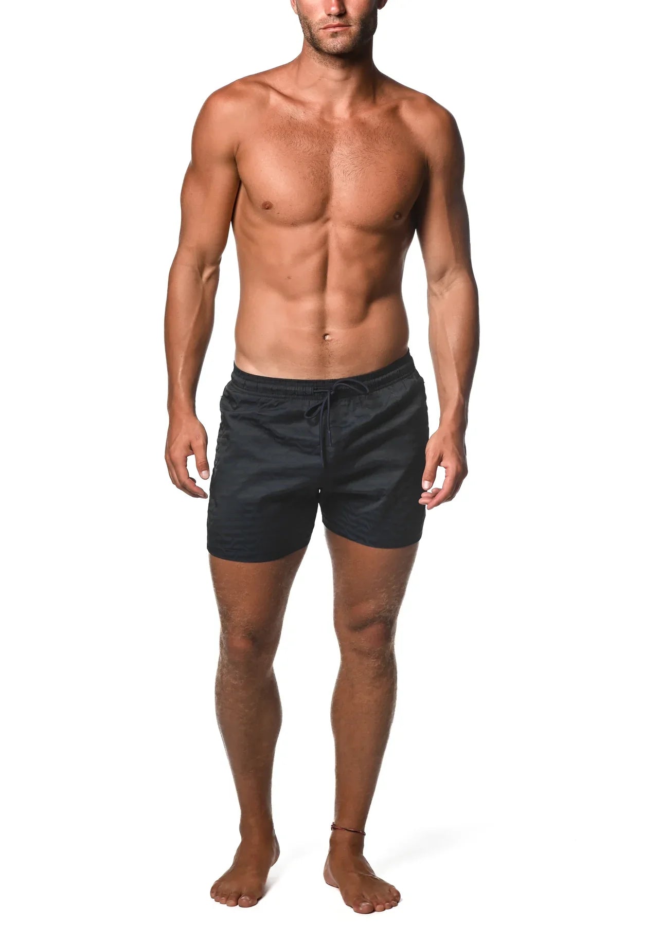 Black jacquard stretch swim trunks with drawstring and mesh liner for comfortable swimwear use