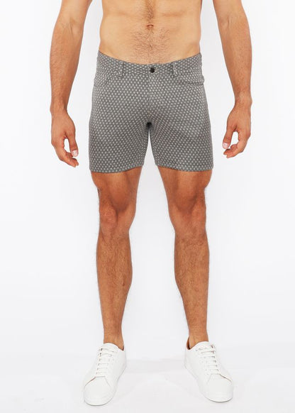 Gray jaquard stretch knit chino shorts with subtle white polka dots made from lightweight fabric