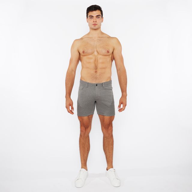 Gray jaquard stretch knit chino shorts with subtle white polka dots made from lightweight fabric