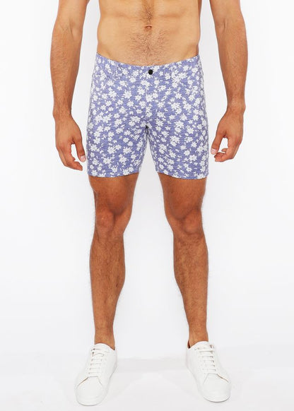 Purple floral-patterned jaquard stretch knit men’s shorts with black button closure for casual wear