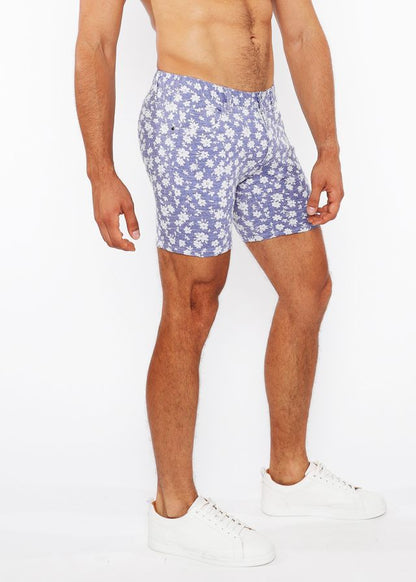 Blue floral patterned jaquard stretch knit shorts with white flowers on light blue fabric