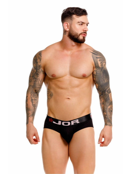 Black jor 2331 cronos briefs with white logo and red star on waistband in a comfortable cotton blend fabric