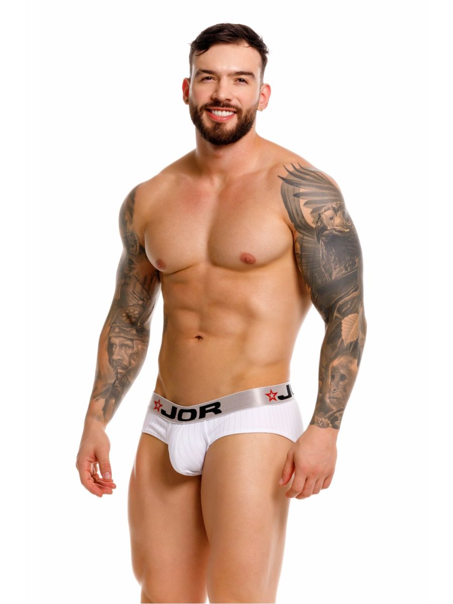 White jor 2331 cronos briefs with a silver waistband featuring black lettering and red star logos front view