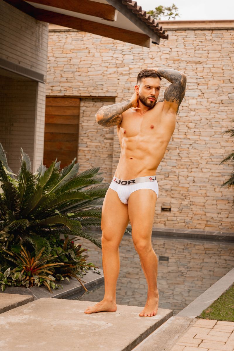 White jor 2331 cronos briefs featuring white branded fabric with a subtle logo on the waistband front view