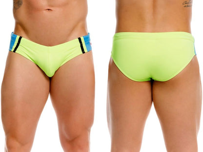 Jor 2384 wind swim briefs in vibrant neon green with blue and black striped side panels for beach use