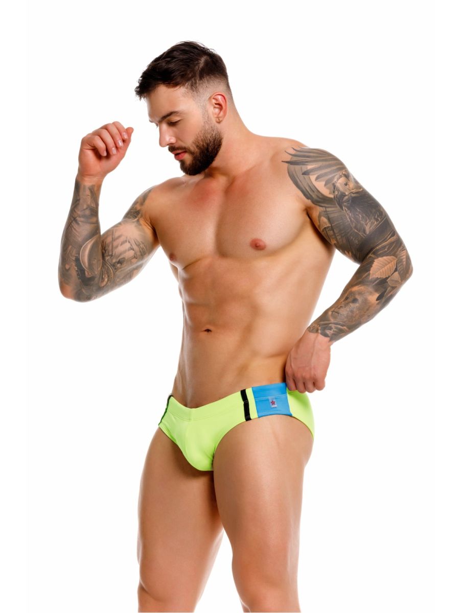 Neon green jor 2384 wind swim briefs with blue and black accent panel at waistband for swimming and beachwear