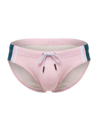 Jor 2384 wind swim briefs in pink with teal and white striped side panels and drawstring closure for swimming