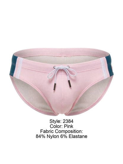 Pink jor 2384 wind swim briefs with teal and white side stripes and a drawstring closure for swimwear use