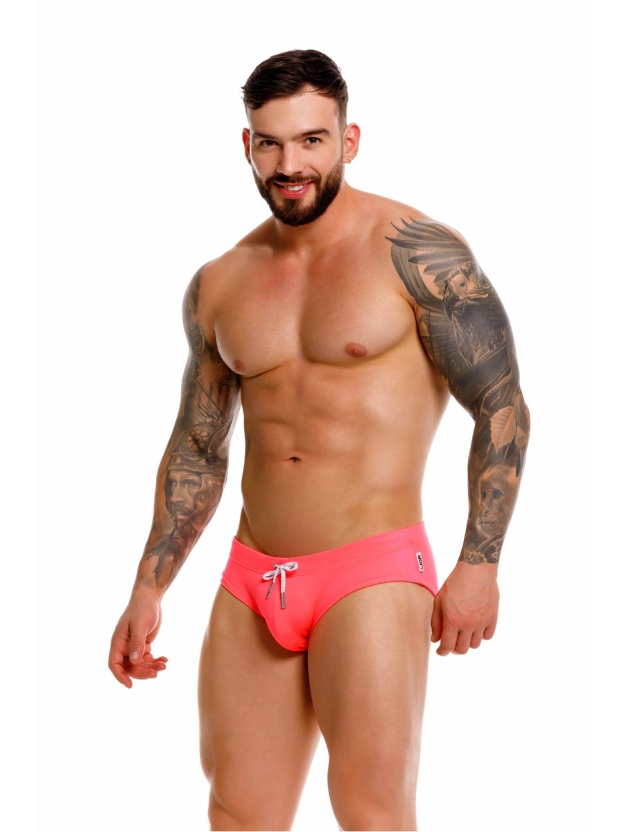 Vibrant pink jor 2387 travel swim briefs with white drawstring and subtle brand logo on the side in color candy
