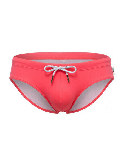 Coral-colored jor 2387 travel swim briefs with white drawstring and mesh lining for comfortable swimming