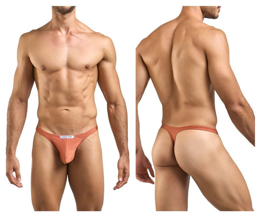 A sleek peach-colored ochre thong from JUSTIN+SIMON XSJ03 made of smooth fabric with a minimalist design and white label