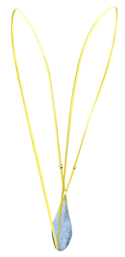 A delicate justin simon xsj04 sling color lurex blue gold-toned necklace with a shimmering blue glitter teardrop pendant