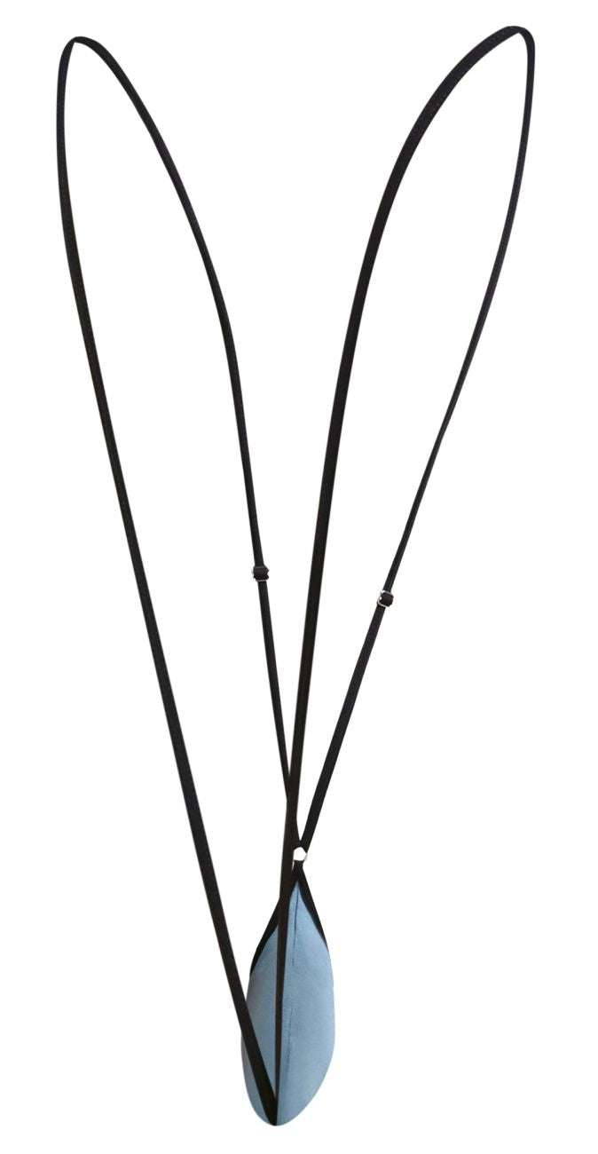 Black cord necklace with light blue teardrop pendant paired with justin+simon xsj04 sling color metal green bag