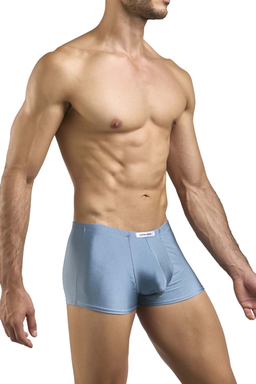 Light blue form-fitting boxer briefs with subtle textured fabric and white brand tag at waistband for classic comfort
