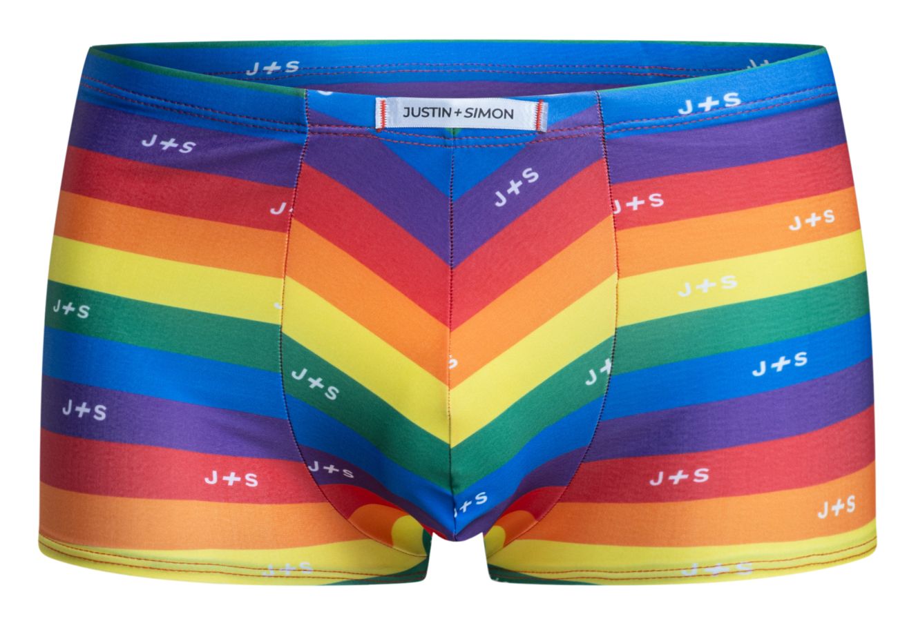 Rainbow-striped men’s briefs by justin simon with chevron pattern and repeating js logo in classic pride flag colors