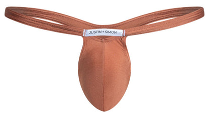 A rust-colored seamless thong made of soft fabric with a justin plus simon branded label at the center