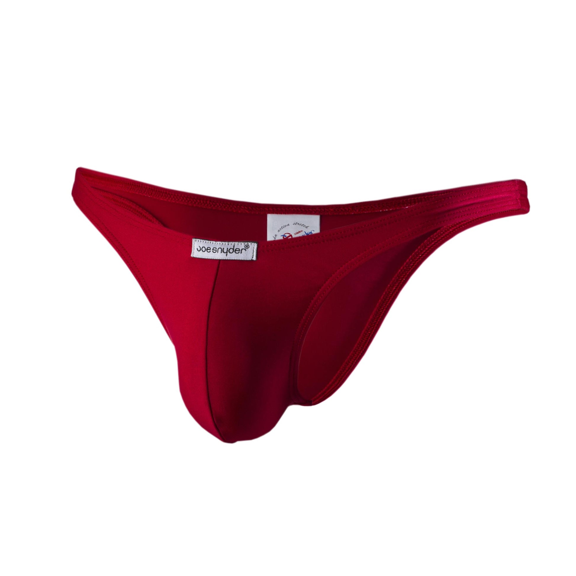 A vibrant red joe snyder polyester capri thong made of smooth stretchy fabric with a branded label shown from the back