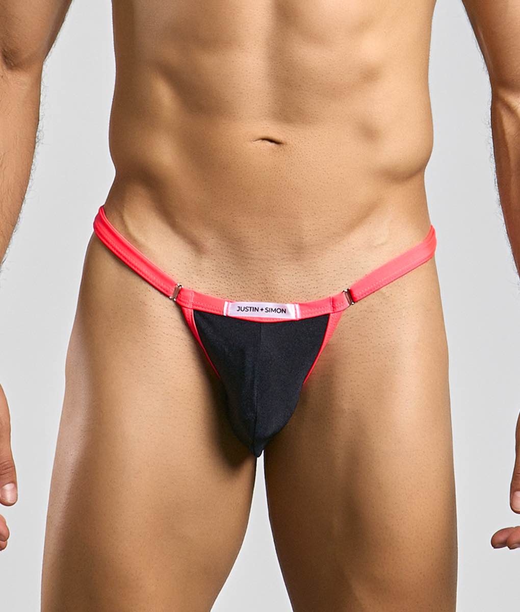 A vibrant red and black thong from justin + simon bikini one with a sleek minimalist design showing the back side