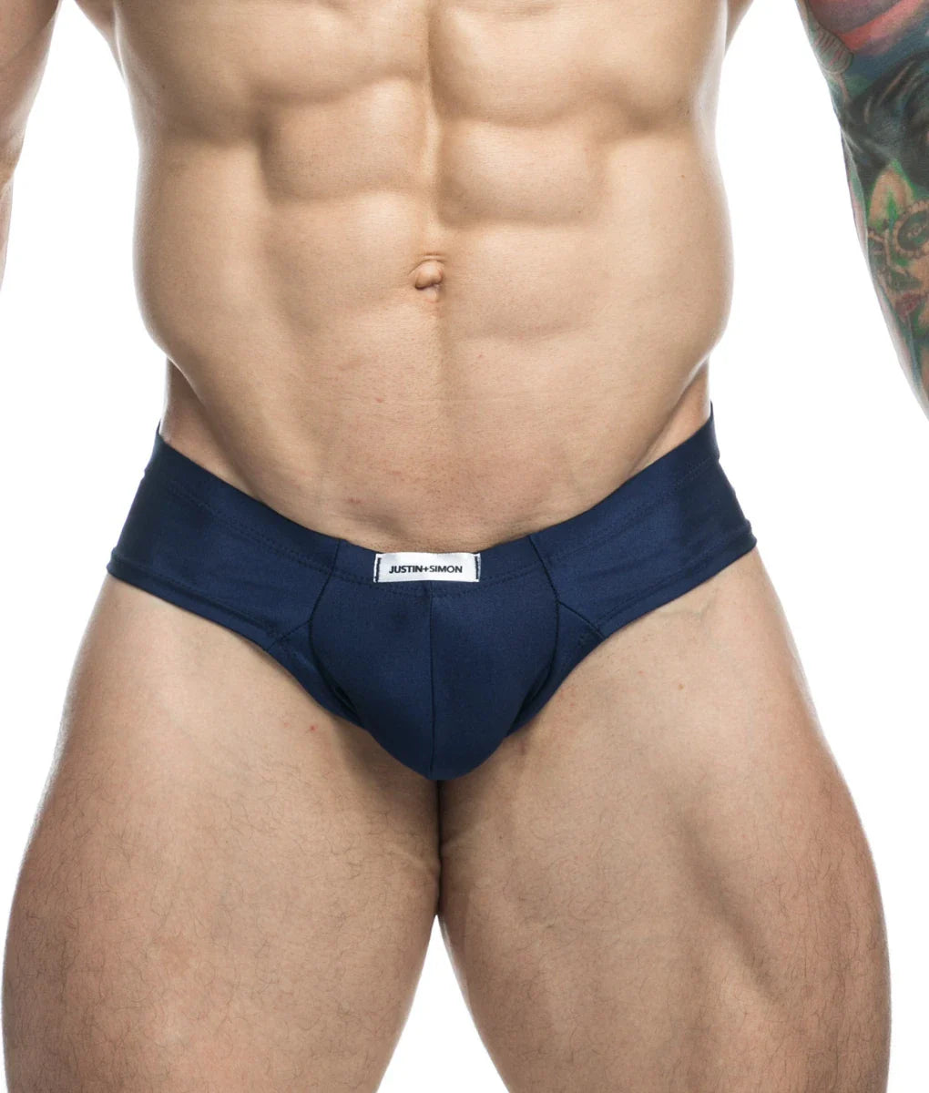 Navy blue Justin Simon cheek final sale briefs with a white waistband label designed for comfortable everyday wear