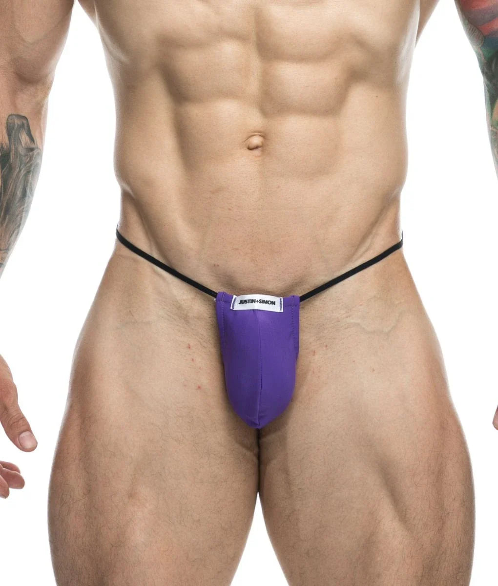 Purple justin + simon classic g-string bulge athletic briefs with black waistband and white brand label visible
