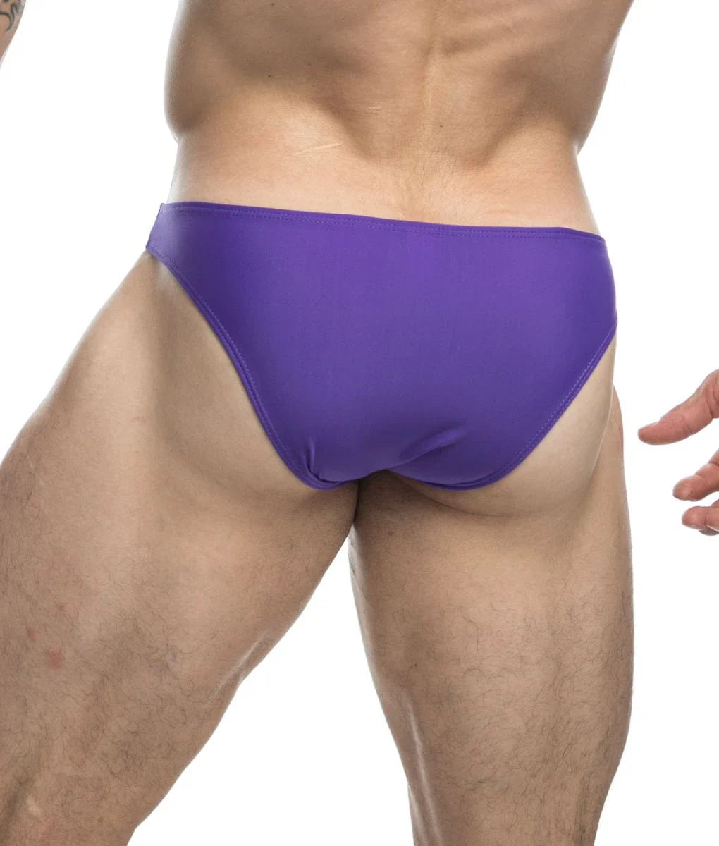 Purple swim trunks with a smooth form-fitting design from justin + simon classic mens bikini final sale collection