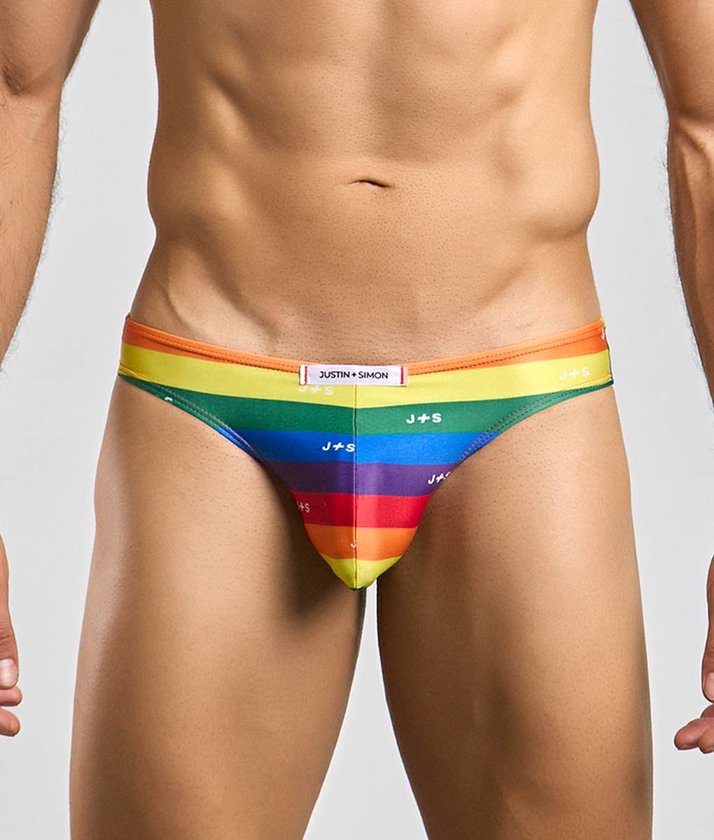 Justin + Simon classic mens bikini briefs with rainbow orange to purple gradient and repeating j plus s logos
