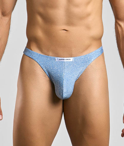 Light blue glittery thong by Justin Simon classic tanga showcasing sparkling fabric and minimal coverage design