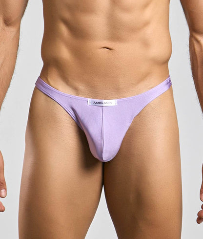 Lavender-colored form-fitting thong by Justin Simon classic tanga designed for comfortable everyday wear