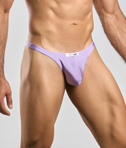 Lavender classic tanga thong by justin + simon made of smooth fabric with small white label on waistband showing back side