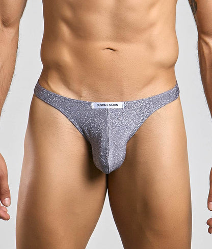 Silver glittery thong from justin simon classic tanga style showcasing front side with sparkling fabric details