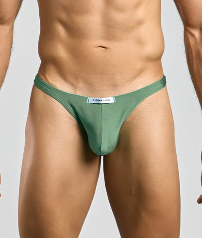 Justin Simon classic tanga olive green thong made of smooth fabric with minimalist design and small white waistband label