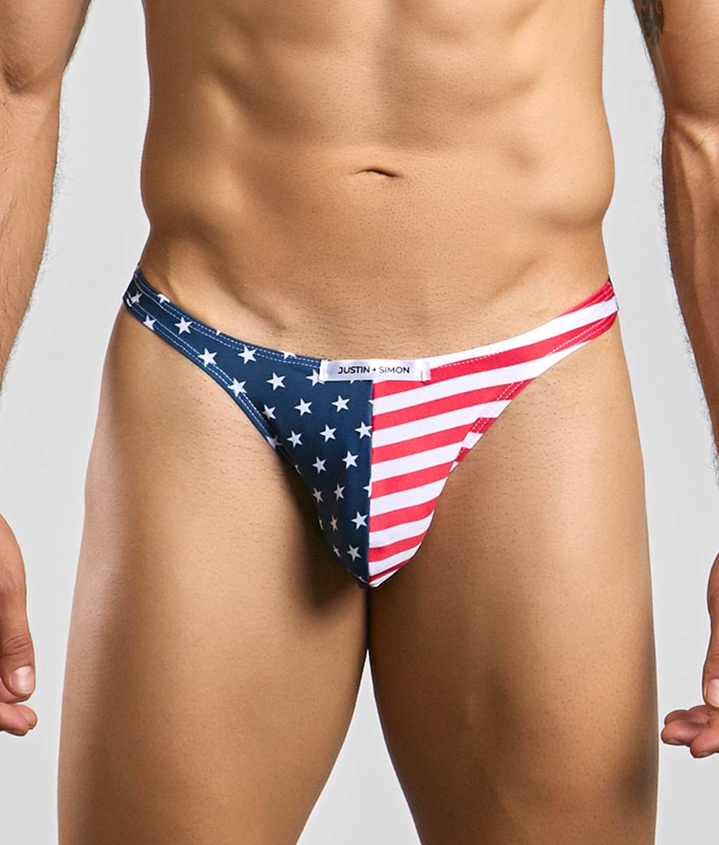 Blue and red american flag patterned thong with white stars and justin simon brand label classic tanga style