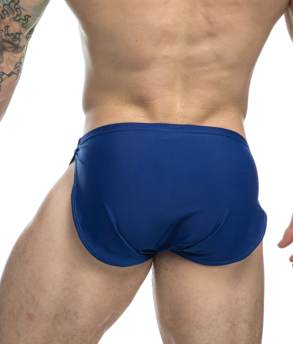 Blue Justin + Simon running shorts with smooth form-fitting fabric and subtle side seam detail for active use