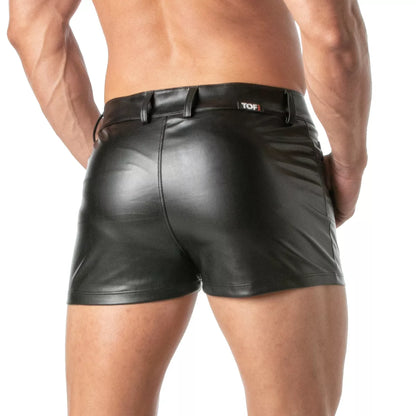 Black faux leather kinky mini shorts with a sleek glossy finish and a branded tof belt loop visible on the front