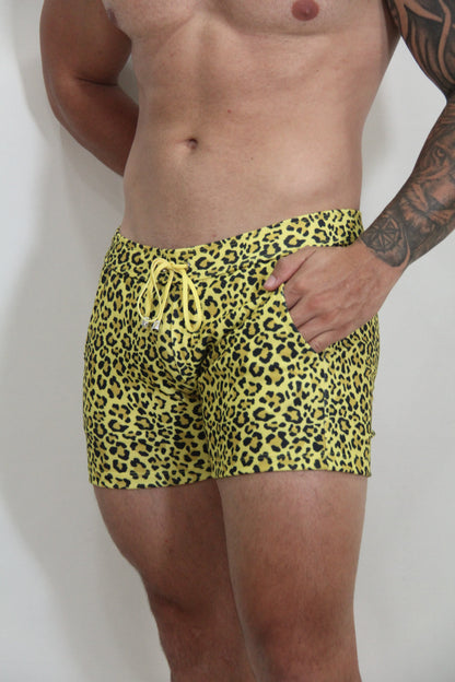 Bright yellow leopard fleece short swim trunks with matching drawstring waistband in soft fleece material