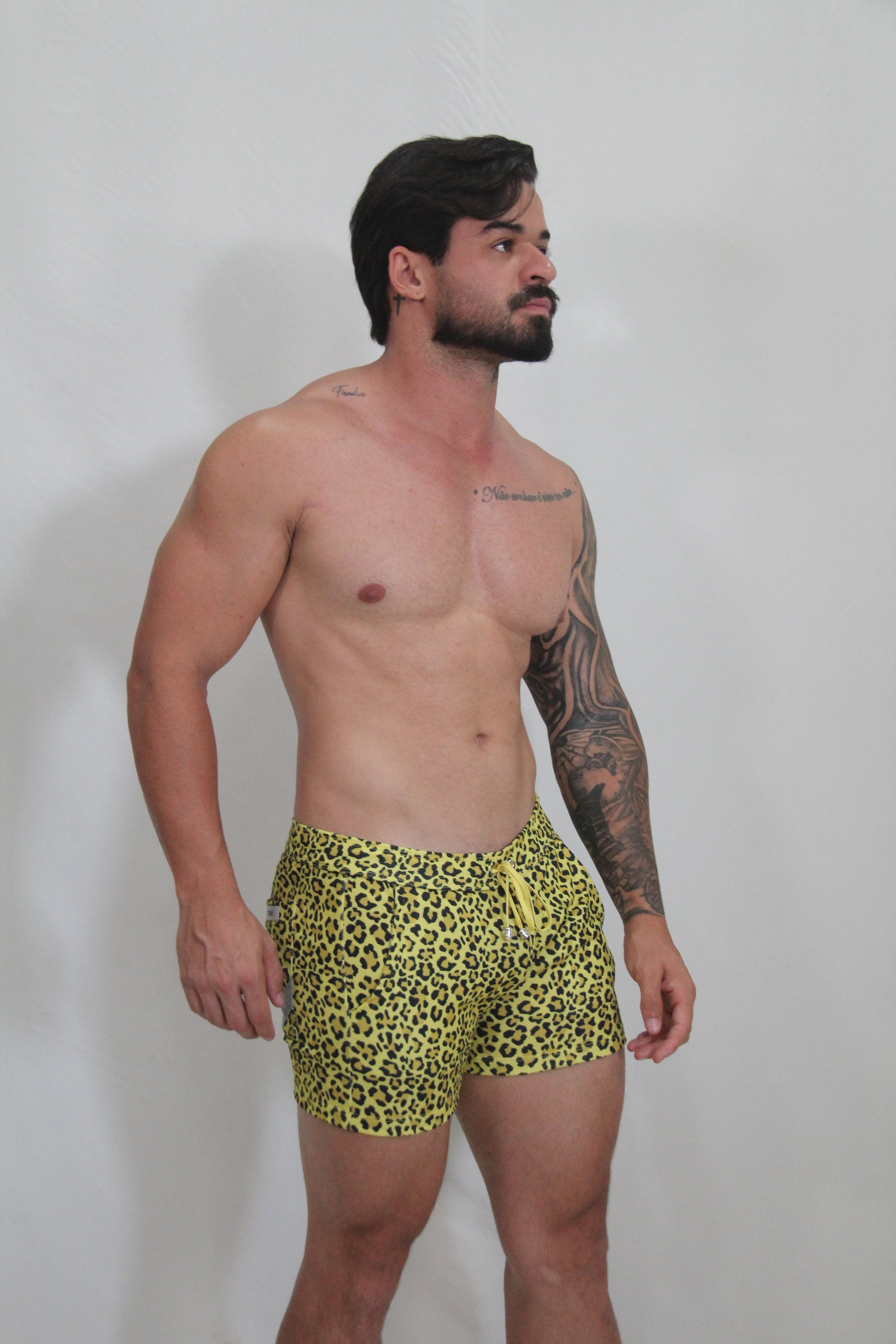 Bright yellow leopard fleece short swim trunks with drawstring waistband for comfortable beachwear