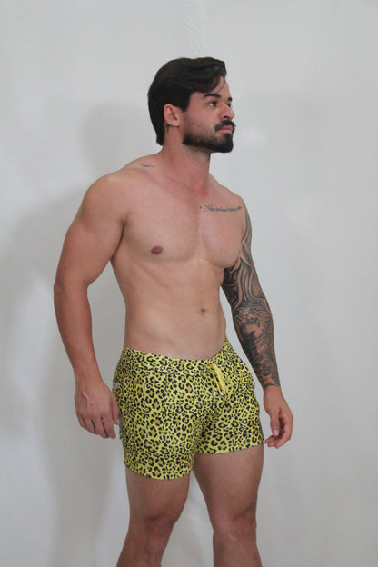 Bright yellow leopard fleece short swim trunks with drawstring waistband for comfortable beachwear
