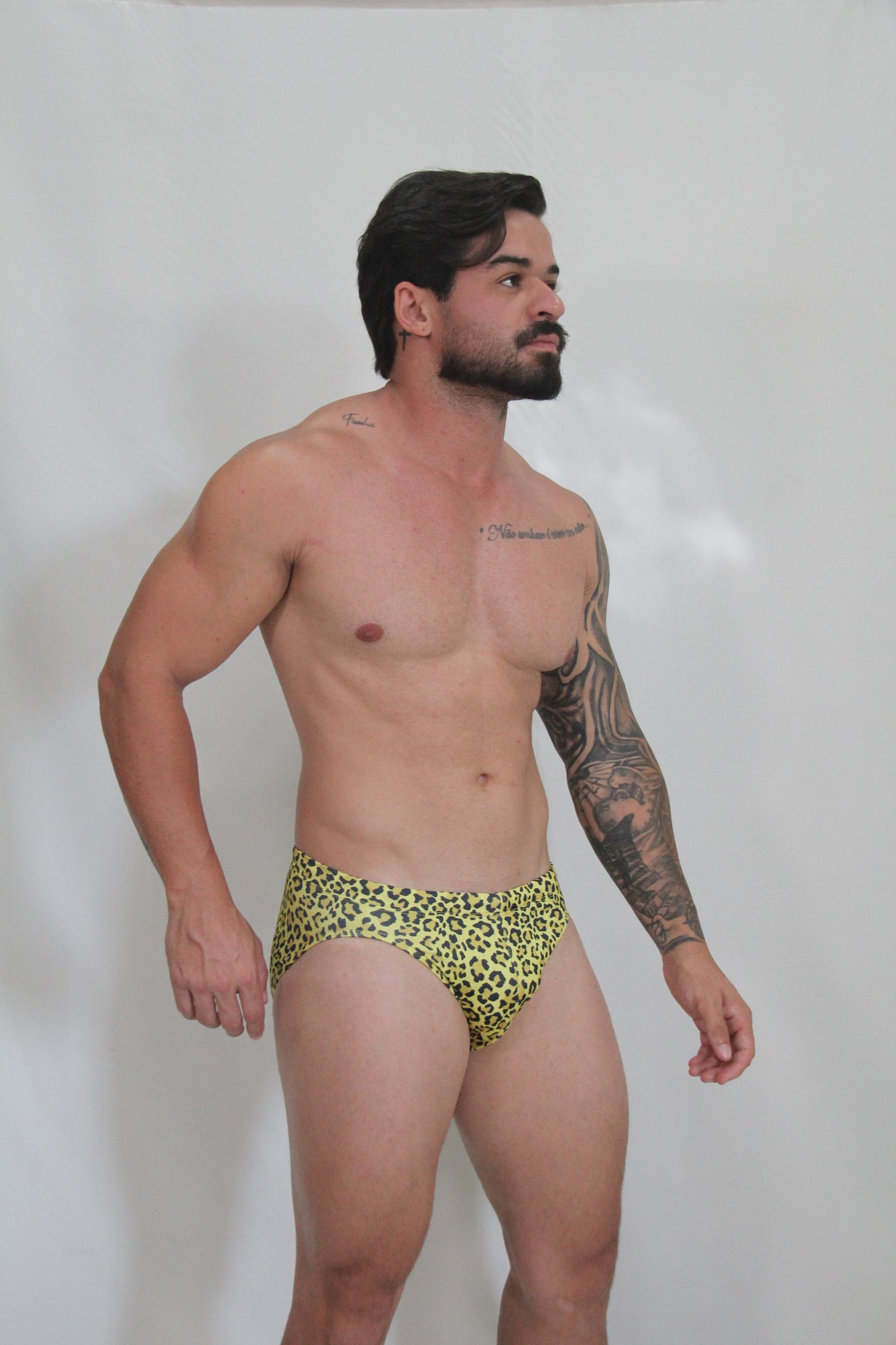 Bright yellow leopard-print swim brief made of lightweight fabric for stylish swimwear use