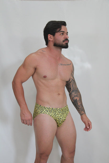 Bright yellow leopard-print swim brief made of lightweight fabric for stylish swimwear use