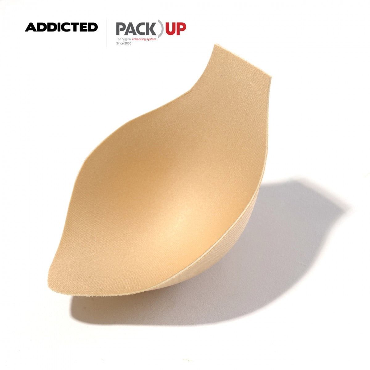 Beige silicone underwire bra cup from addicted pack up brand shown with leopard swim brief for swimwear use