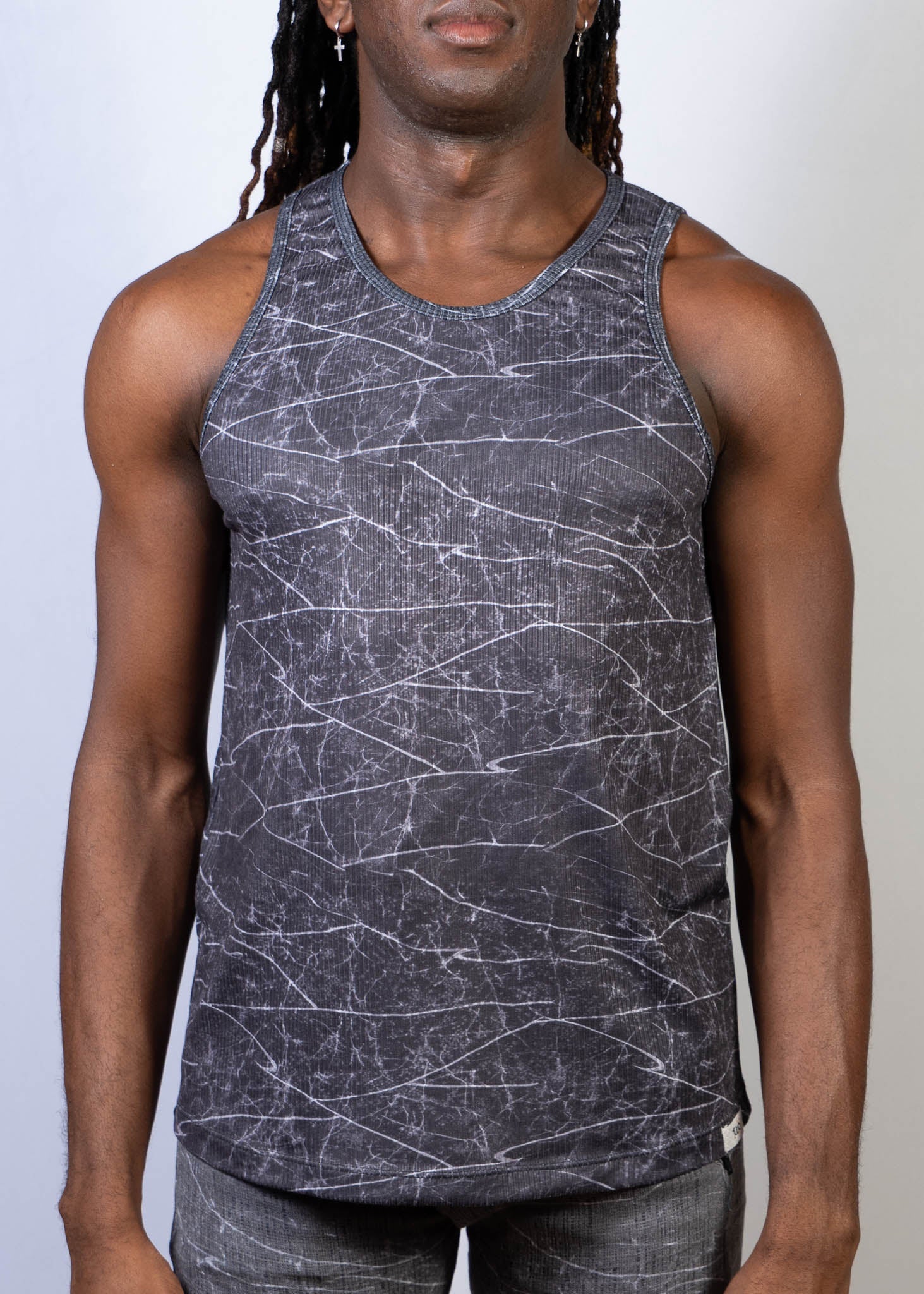 Dark gray lightning print tank top with white crackle pattern on lightweight breathable fabric for casual wear