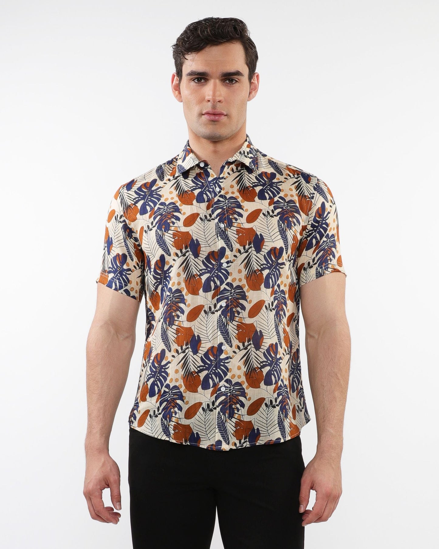 Lightweight linen tencel short-sleeved shirt with vibrant navy blue orange cream tropical leaf and fruit print on beige