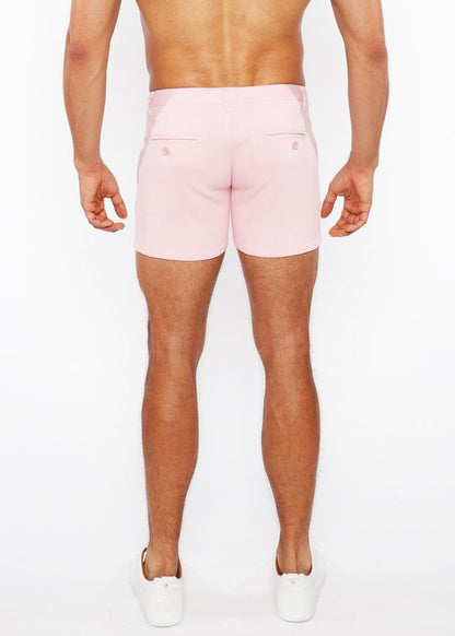 Pink linen-look textured men’s shorts with tailored fit and two back pockets shown from the back side