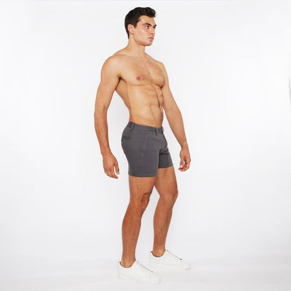 Gray linen-look textured athletic shorts with zip pockets and subtle waistband detail in a sleek modern design